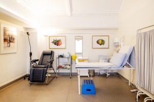 Clinical area equipped for performing assessments, featuring essential medical tools and a professional, well-organised environment for patient evaluations.